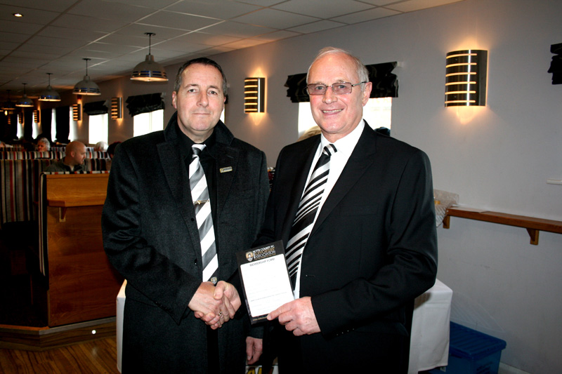 Tony Guy the first NCFCOSA Chairman handing Les Bradd his membership.2014
